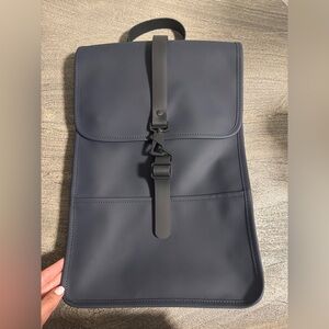 Navy Blue Minimalist Backpack with Water-Resistant Material